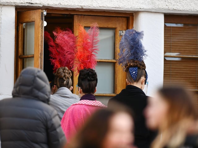 Spot the feathers!
Cast members heading into the Hippodrome.