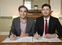 The SNP's Adam McVey and Labour's Cammy Day sign their coalition agreement at the City Chambers in 2017 (Picture: Greg Macvean)