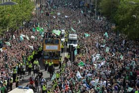 EDINBURGH, SCOTLAND - MAY 22: The Hibernian FC team celebrate winning the Scottish Cup yesterday against Rangers FC as they parade the Scottish Cup to their fans on an open top bus along Leith Walk on May 22, 2016 in Edinburgh, Scotland. (Photo by Mark Runnacles/Getty Images)