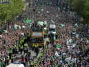 EDINBURGH, SCOTLAND - MAY 22: The Hibernian FC team celebrate winning the Scottish Cup yesterday against Rangers FC as they parade the Scottish Cup to their fans on an open top bus along Leith Walk on May 22, 2016 in Edinburgh, Scotland. (Photo by Mark Runnacles/Getty Images)