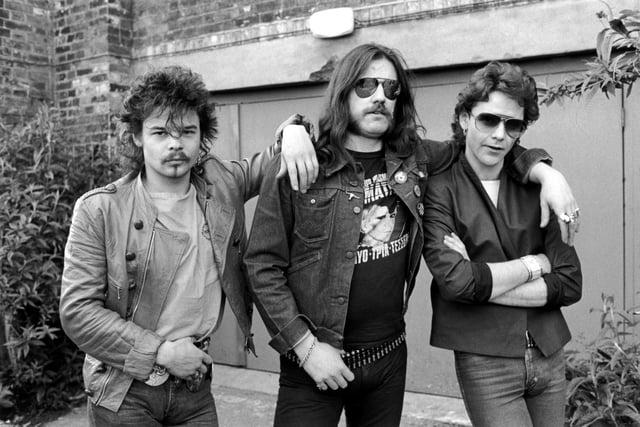 Phil Taylor, seen on the left here with Lemmy Kilmister and Brian Robertson was the drummer with hard rockin' aces Motorhead and hailed from Hasland.