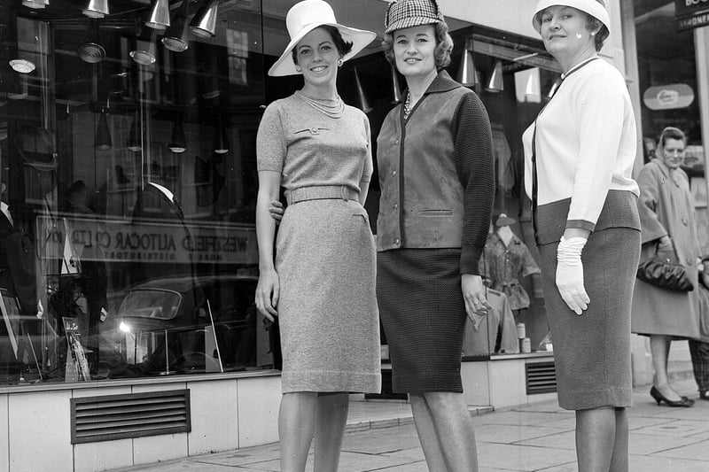 A 'mannequin parade' is pictured taking place outside knitwear store James Howe Ltd on Lothian Road in 1963. The impromtu fashion show included the very latest in designer wear.