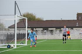 The ball is clearly out of play before bouncing back onto the field and converted by Blair Henderson for the opening goal. (Picture: Mark Brown / Spartans FC)