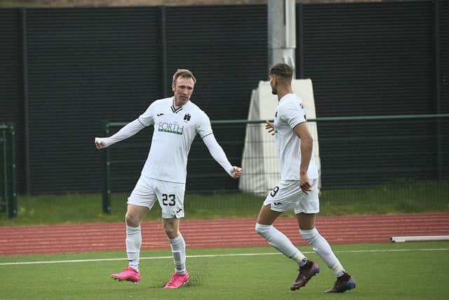 Innes Murray celebrates his equaliser with Ouzy See. Picture: Tommy Lee.