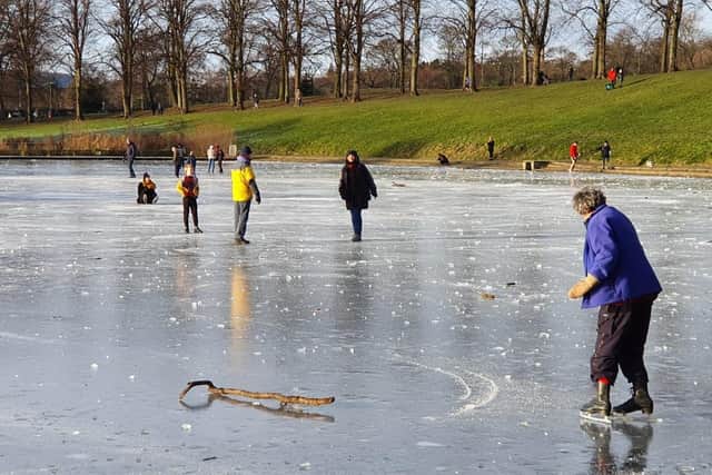 The scene was captured by an onlooker in Inverleith Park, who said around 30 people were enjoying the make-shift ice rink, with 40 others enjoying the spectacle from the banks.