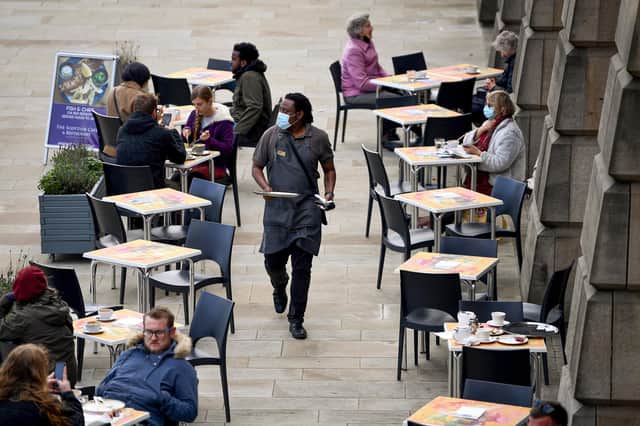 Members of the public are seen sitting in a cafe in Edinburgh. Picture: Jeff J Mitchell/Getty Images