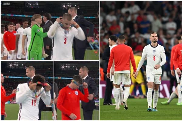 England players, including Luke Shaw, Mason Mount and Jack Grealish took off their silver medals during the presentation ceremony (BBC/Getty Images)
