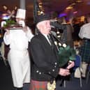 The haggis is piped in at the 'world's biggest burns supper' at Edinburgh's Corn Exchange in 2003.