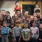 A group of Ukrainian orphans due to fly to the UK after fleeing war in their home country are stuck in Poland after a key piece of paperwork was not provided in time.