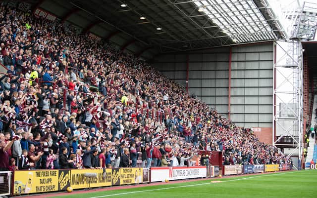 Hearts fans have been asked to provide a minute's applause for two fans during the game with Dundee on Saturday. (Photo by Ross Parker / SNS Group)