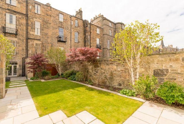 To the back of the property is a walled landscaped garden with a path that leads to a double garage with electric security doors. To the front of the property is a private courtyard with three cellars