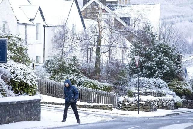 A person walking through Killin, Stirlingshire, in icy and snowy conditions picture: JPI Media
