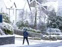 A person walking through Killin, Stirlingshire, in icy and snowy conditions picture: JPI Media