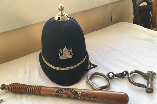 A truncheon, set of handcuffs and a helment once worn by members of Leith Burgh Police (Picture: Tom Wood)