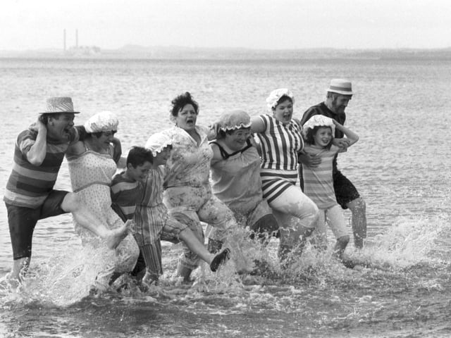 Don't be fooled by the clothing. This picture isn't from the Victorian era. In June 1989, locals dressed in historical costume for a splash in the sea during the Portobello 'Victorian Splash'.
