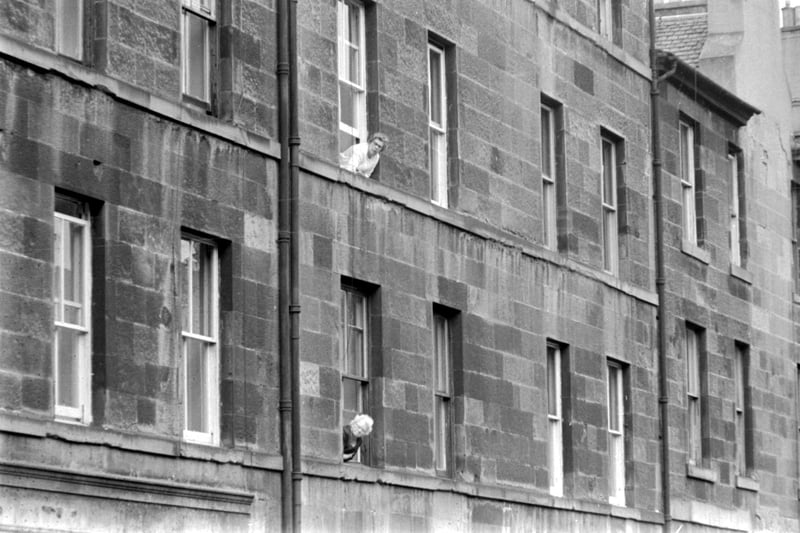 Women hanging out of the windows in St Stephen Street, Stockbridge, in June 1971.