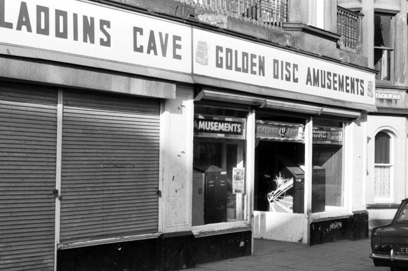 Exterior of Aladdins Cave and Golden Disc Amusements, an amusement arcade in Bath Street, February 1981.