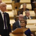 Deputy First Minister John Swinney MSP was watched by First Minister Nicola Sturgeon as he delivered his budget to the Scottish Parliament.Picture: Andrew Cowan/Scottish Parliament/PA Wire
