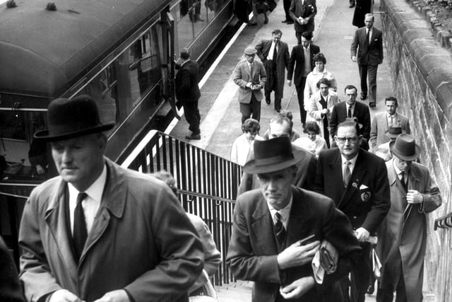 Commuters file up the steps from the platform as they make their way out of Morningside railway station, 1961.