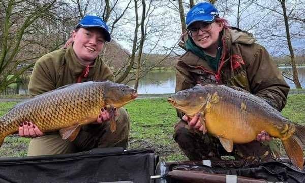Catherine Robertson (left) and Niki Wildman with two of the fish they caught at Wyreside