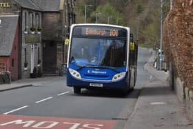 Stock photo of the number 101 Stagecoach bus heading east through West Linton in the Scottish Borders. Photo by Stuart Cobley.