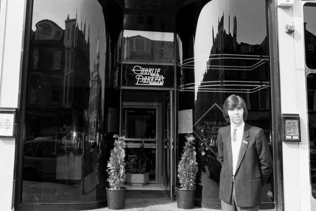 Manager Hugh McShannon stands outside the entrance to Charlie Parkers Restaurant and Cocktail Bar, George Street, September 1981 Photo: Hamish Campbell
