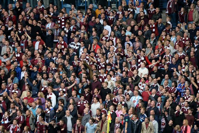 Hearts fans in the away end at Ibrox. Picture: SNS
