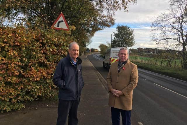 Sandy Hogg , left, with local councillor Damian Doran-Timson at Coxydene. (photo: Stuart Sommerville)