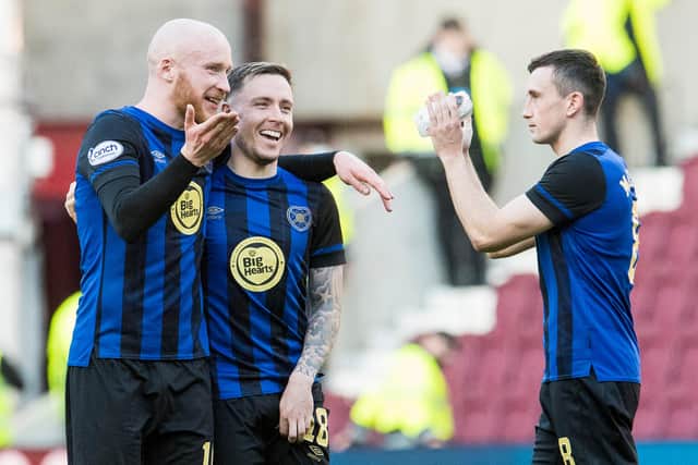 Liam Boyce hangs his arm around Barrie McKay after the winger scored his first goal for the club against Livingston. Picture: SNS