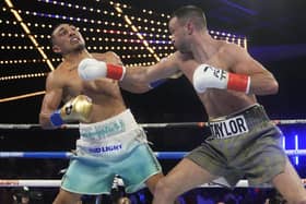 Scotland's Josh Taylor, right, punches Teofimo Lopez during the fourth round in New York, a fight Lopez would go on to win. (AP Photo/Frank Franklin II).