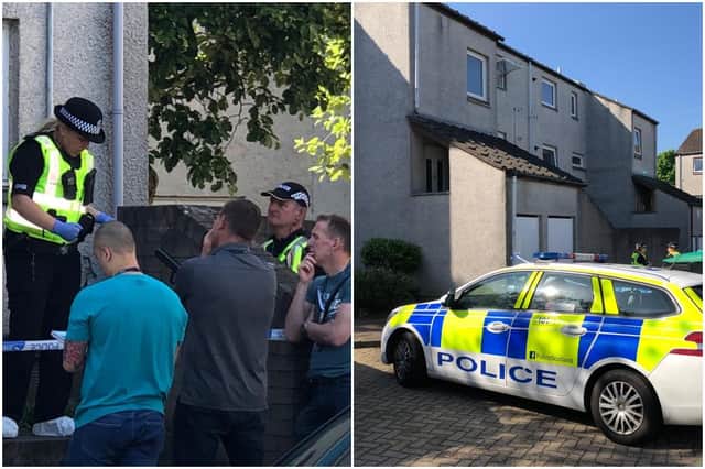 Police pictured dealing with an incident in North Bughtlin Brae, Edinburgh