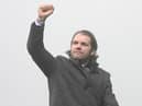 Robbie Neilson raises a celebratory fist towards the Hearts fans after a 1-0 victory over Dundee at Dens Park. Picture: SNS
