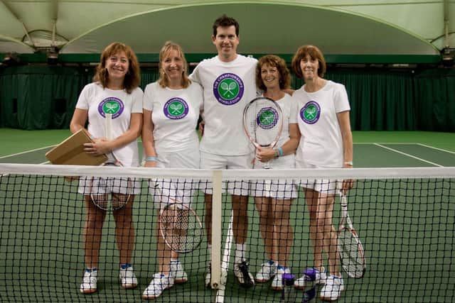 Adele Fletcher, left, with Tim Henman and her North Berwick colleagues