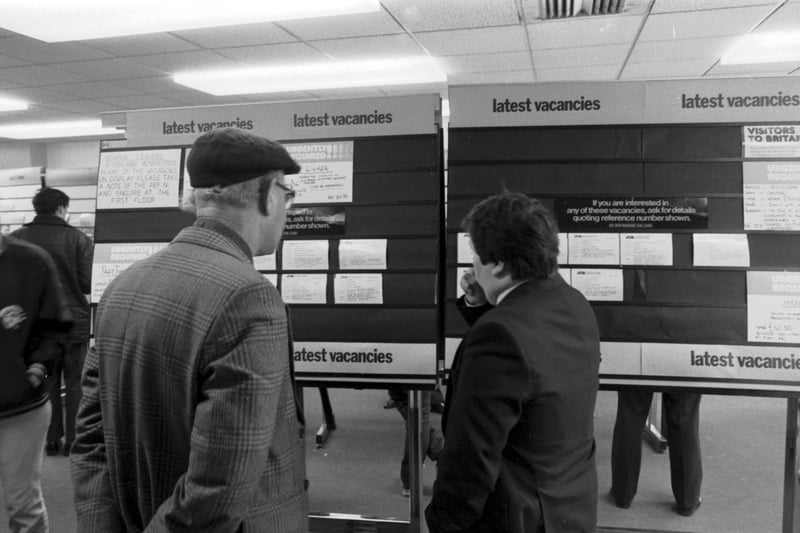 People looking at the job vacancy cards in an Edinburgh JobCentre in June 1981.