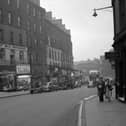 Looking down Leith Street in Edinburgh towards Picardy Place in 1958. Picture shows (left hand side) the Top Deck restaurant, John Collier menswear and Timpson's shoe shop. All these shops were demolished to make way for St James Centre and King James Hotel in 1969.