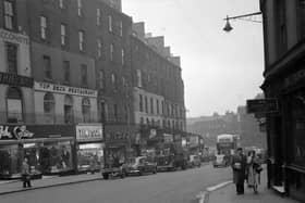 Looking down Leith Street in Edinburgh towards Picardy Place in 1958. Picture shows (left hand side) the Top Deck restaurant, John Collier menswear and Timpson's shoe shop. All these shops were demolished to make way for St James Centre and King James Hotel in 1969.