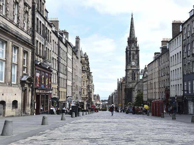 The High Street, which is normally thronged with visitors at this time of year, was virtually deserted on Friday lunchtime. Picture: Lisa Ferguson