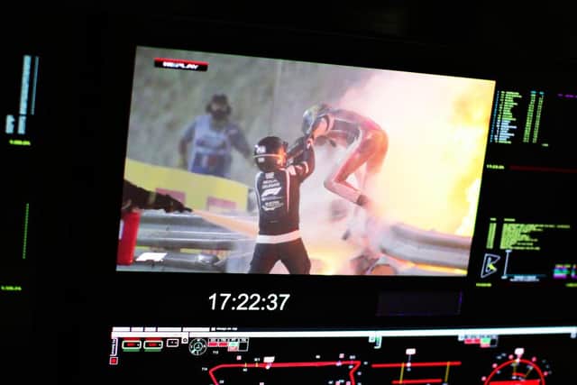 Romain Grosjean is pictured on a screen escaping his crash during the F1 Grand Prix of Bahrain. (Pic: Getty Images)