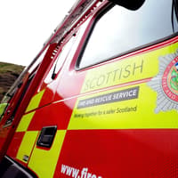 Fire crews rush to Midlothian town after two cars go up in flames on busy Penicuik street
