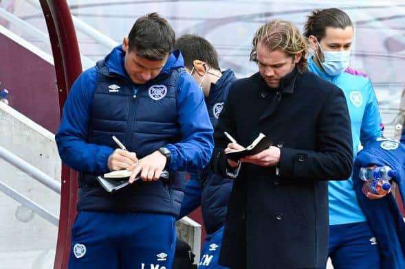 Robbie Neilson (right) has come under criticism from Hearts fans over recent results. (Photo by Rob Casey / SNS Group)