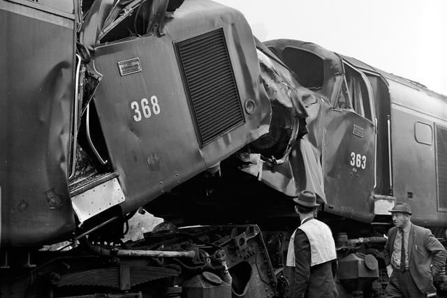 British Railways officials investigate after two diesel trains collided at Leith in August 1970.