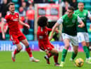 Hibs goalscorer Paul McGinn breaks away from Vicente Besuijen of Aberdeen