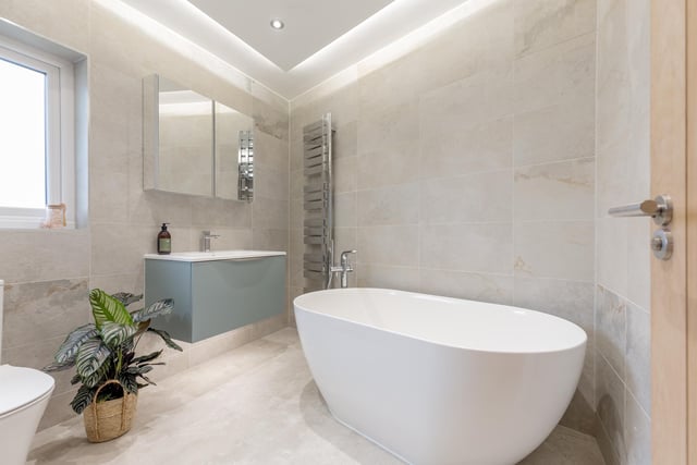 The stunning modern bathroom in this North Berwick property, which also has a hot tub.