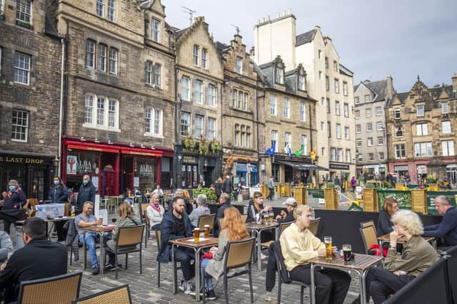 Continental-style outdoor eating and drinking areas have become an increasingly common sight in Edinburgh - seen here in the Grassmarket. Picture: Jane Barlow/PA Wire