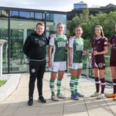 Hibs boss Dean Gibson with players Eilidh Adams and Shannon Leishman, alongside Hearts trio Gwen Davies, Georgia Hunter and manager Eva Olid. Leishman and Davies are holding the Capital Cup. Picture: Contributed