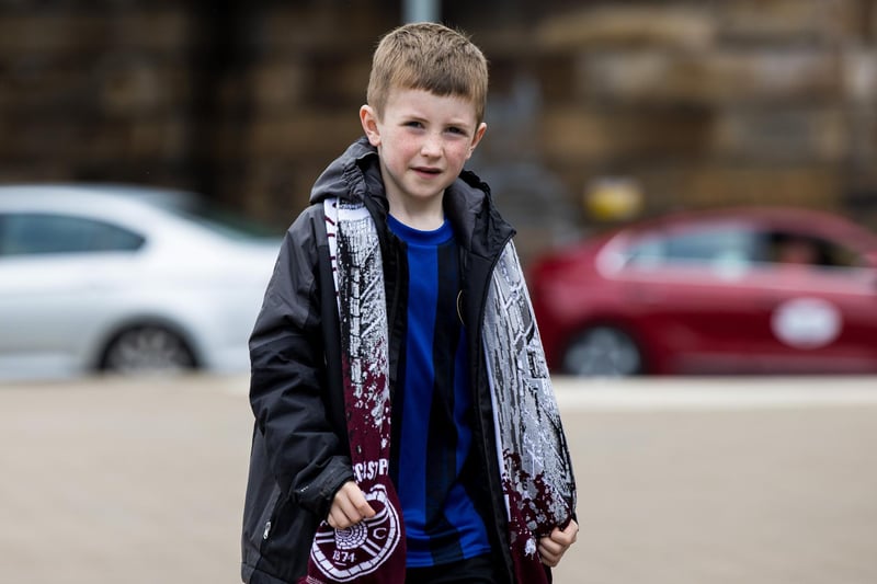 A young fan on his way to the ground