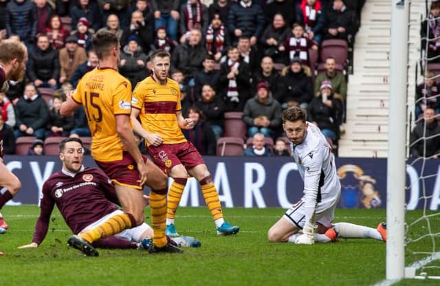 Hearts’ Conor Washington scores the equaliser against Motherwell