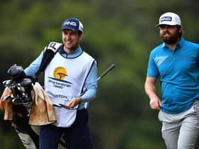 Liam Johnston walks with his caddie on the 15th hole during the opening round of the Kenya Savannah Classic at Karen Country Club in Nairobi. Picture: Stuart Franklin/Getty Images.