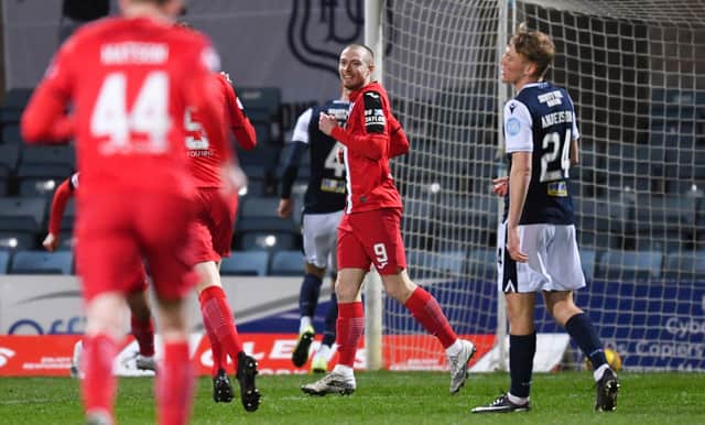 Dunfermline's Craig Wighton (centre) celebrates making it 2-0 during a Scottish Championship match between Dundee and Dunfermline Atheltic at Dens Park, on March 27, 2021, in Dundee, Scotland. (Photo by Ross MacDonald / SNS Group)