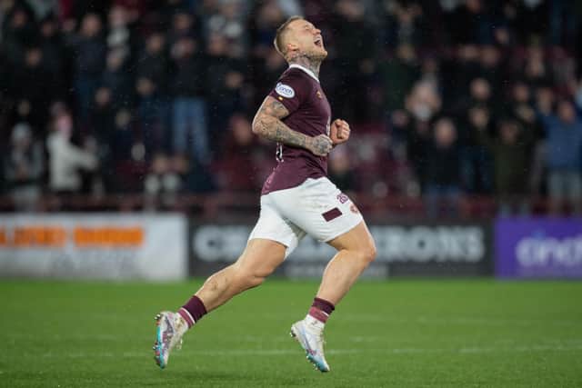 Hearts Stephen Humphrys celebrates his stunning goal to make it 3-1 against Dundee United.